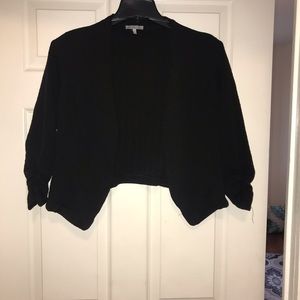 Cropped open front blazer.